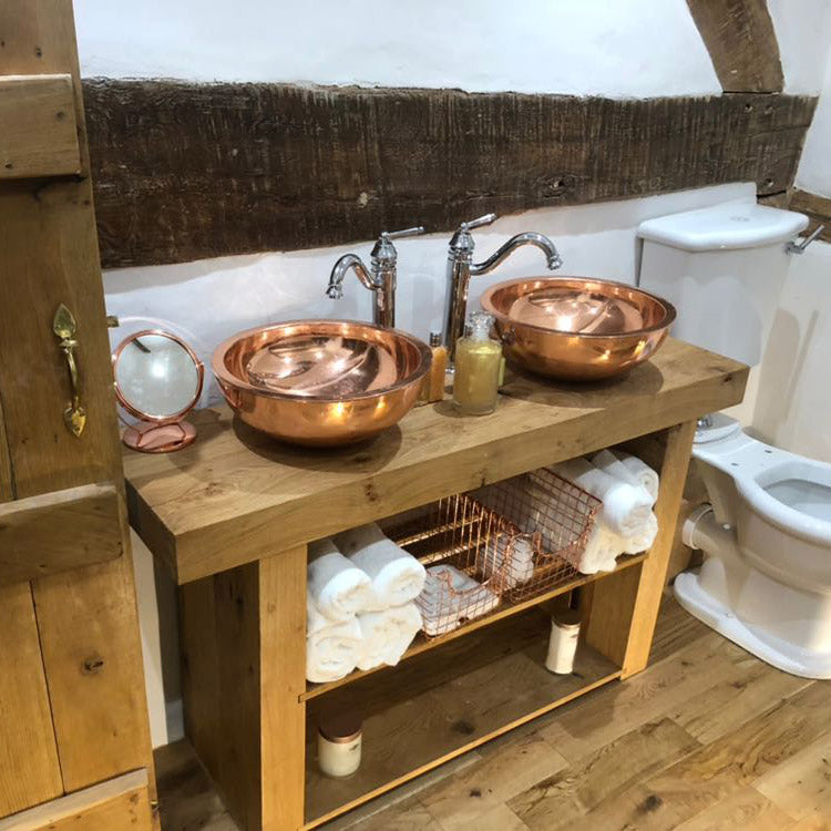 Sink paired with Wood Bathroom Interiors