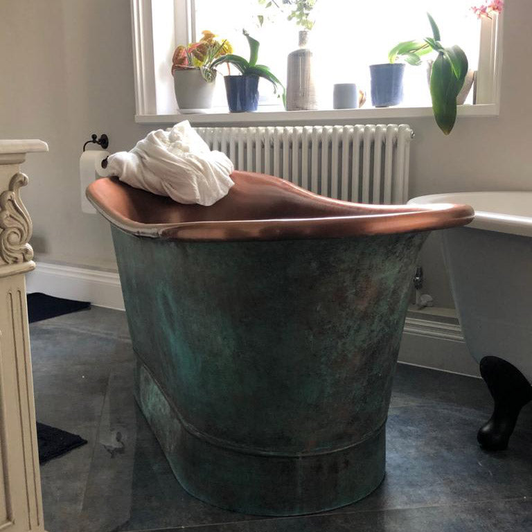 Copper bathtub copper interior & blue green patina exterior with beading on base